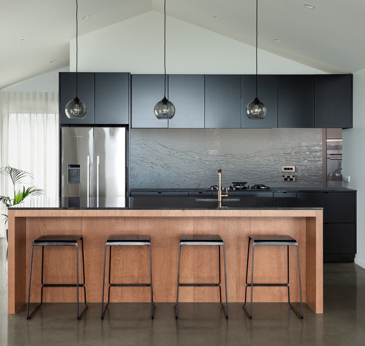 Slumped glass splashback of the beach hand drawn in white