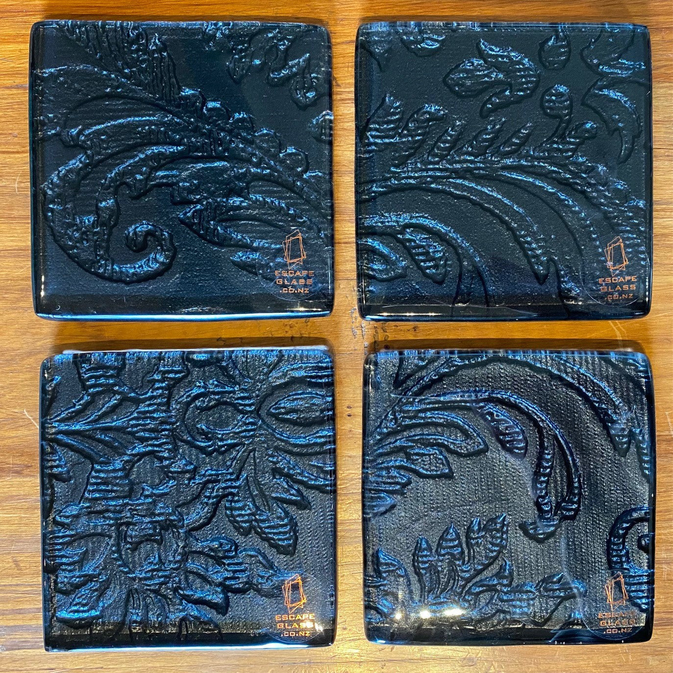 Set of four glass coasters