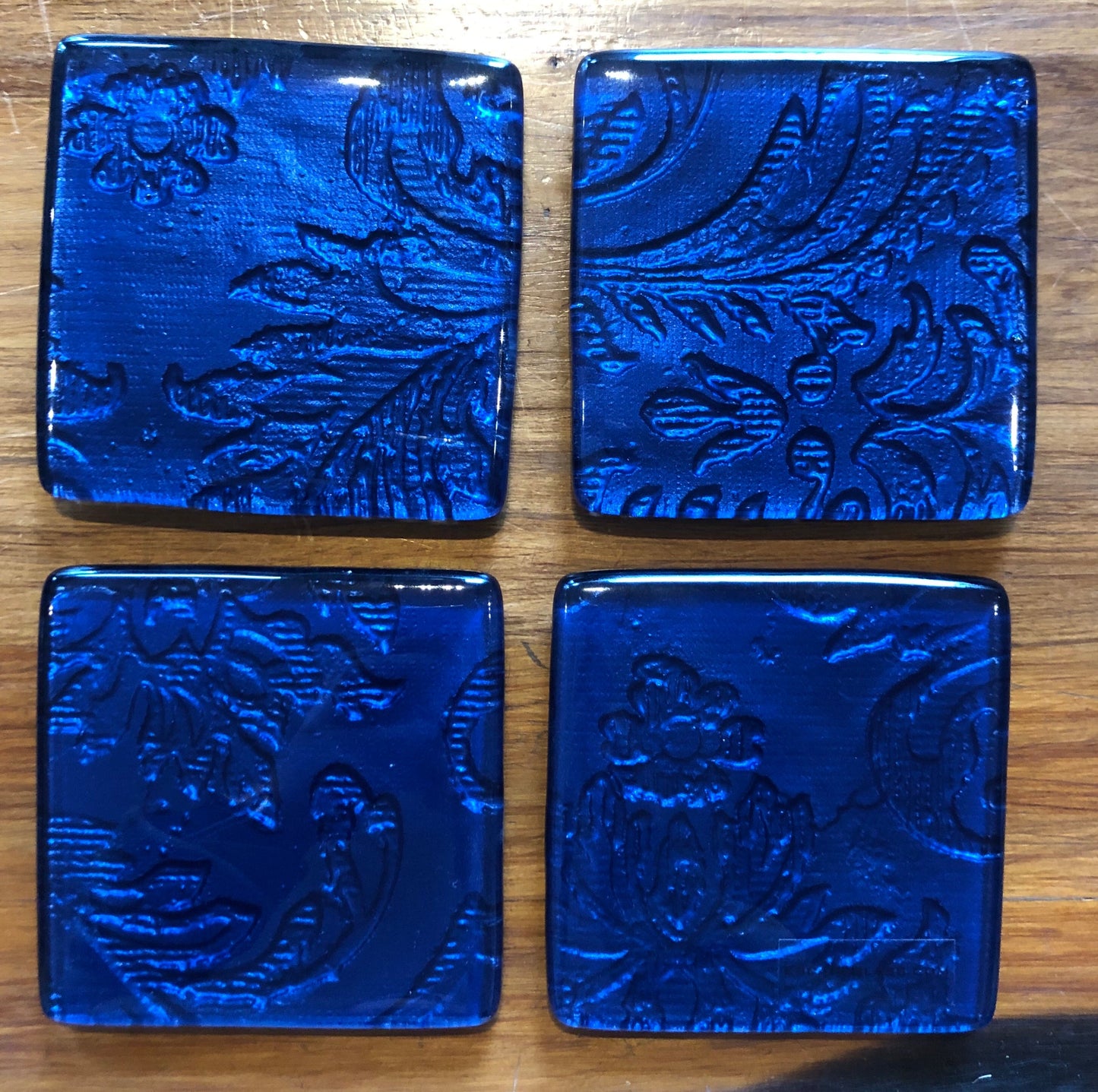 Set of four glass coasters