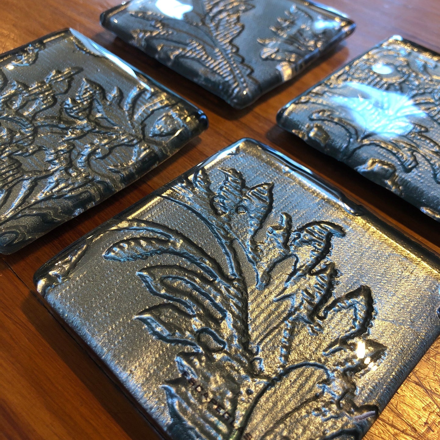 Set of four glass coasters