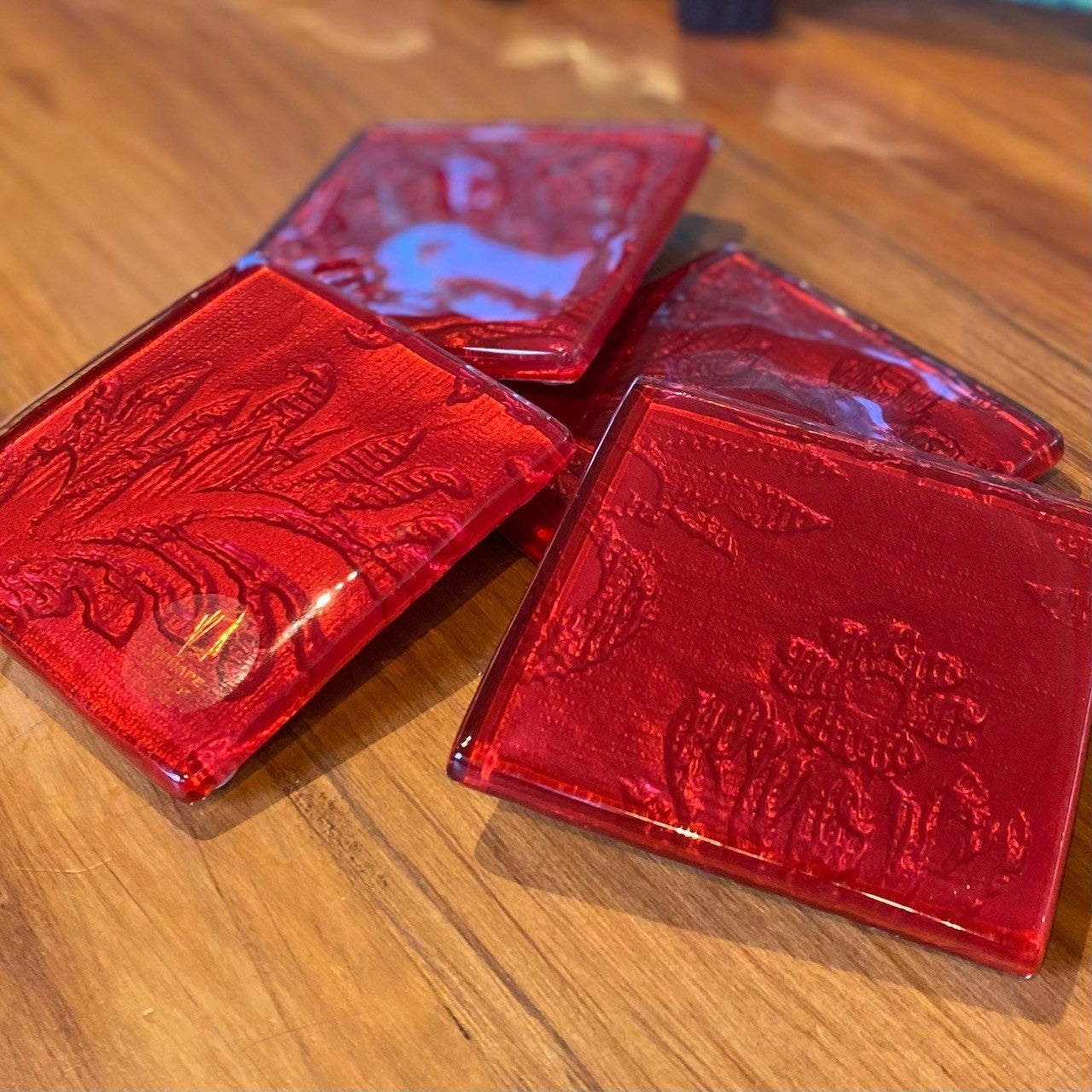 Set of four glass coasters