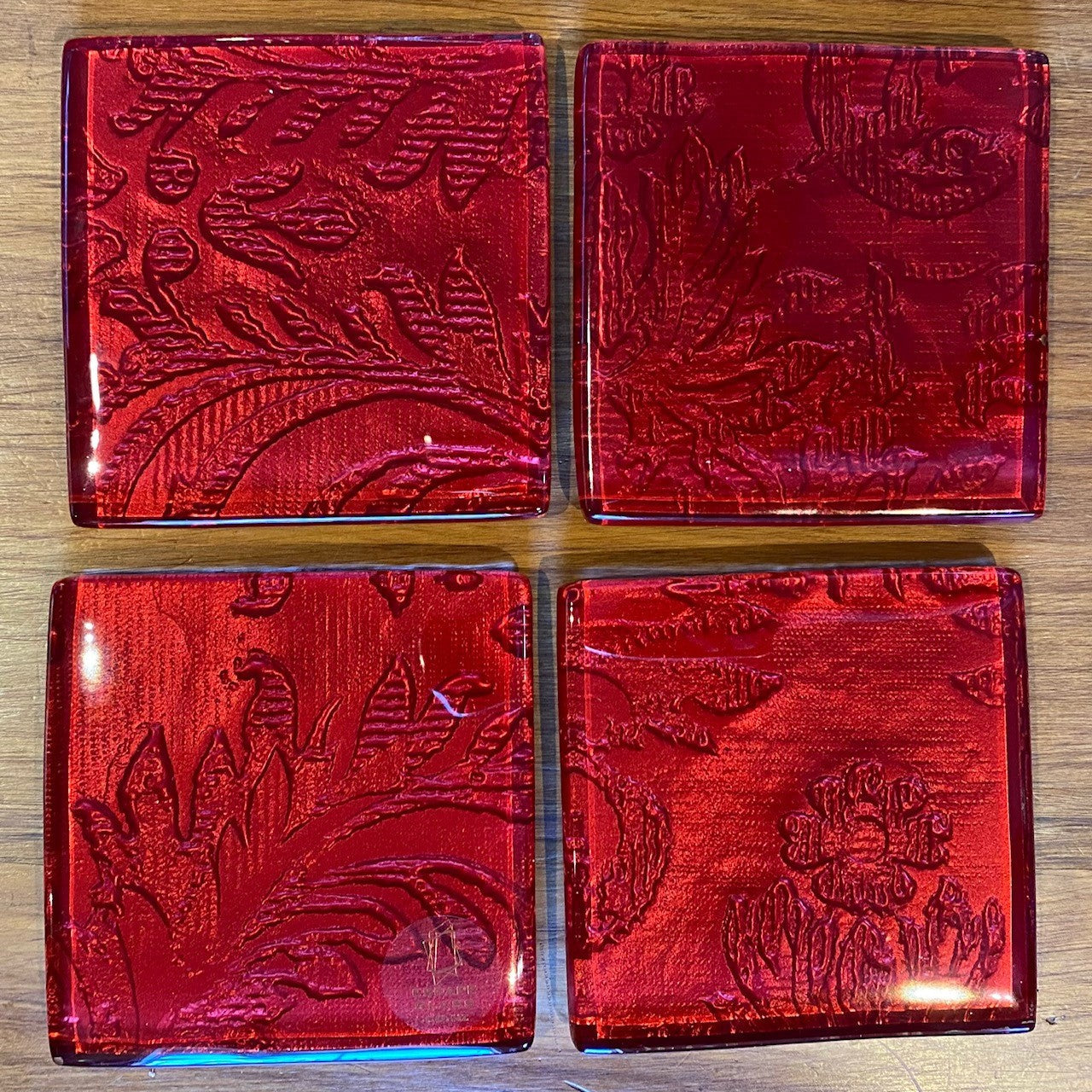 Set of four glass coasters