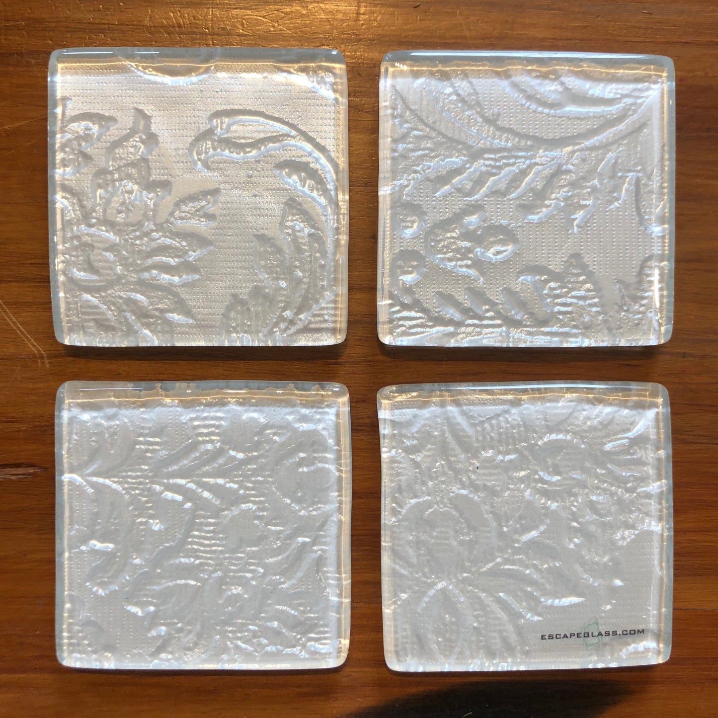 Set of four glass coasters