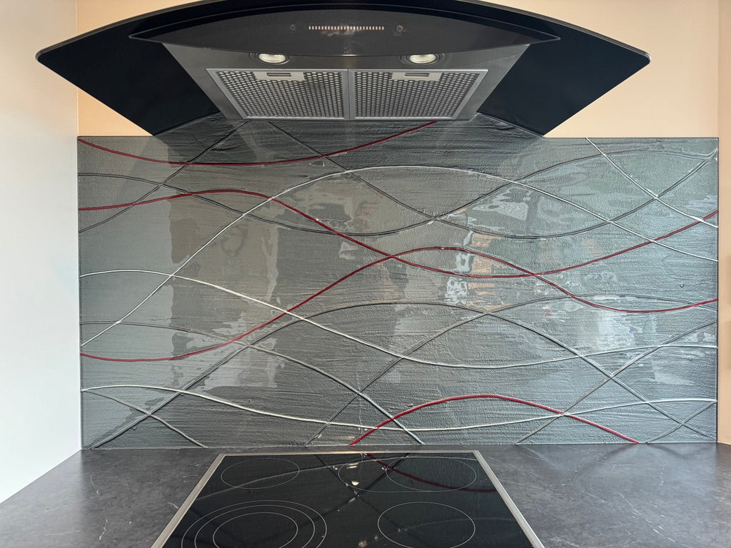 Blast Grey with silver and red lines conformity splashback in slumped glass