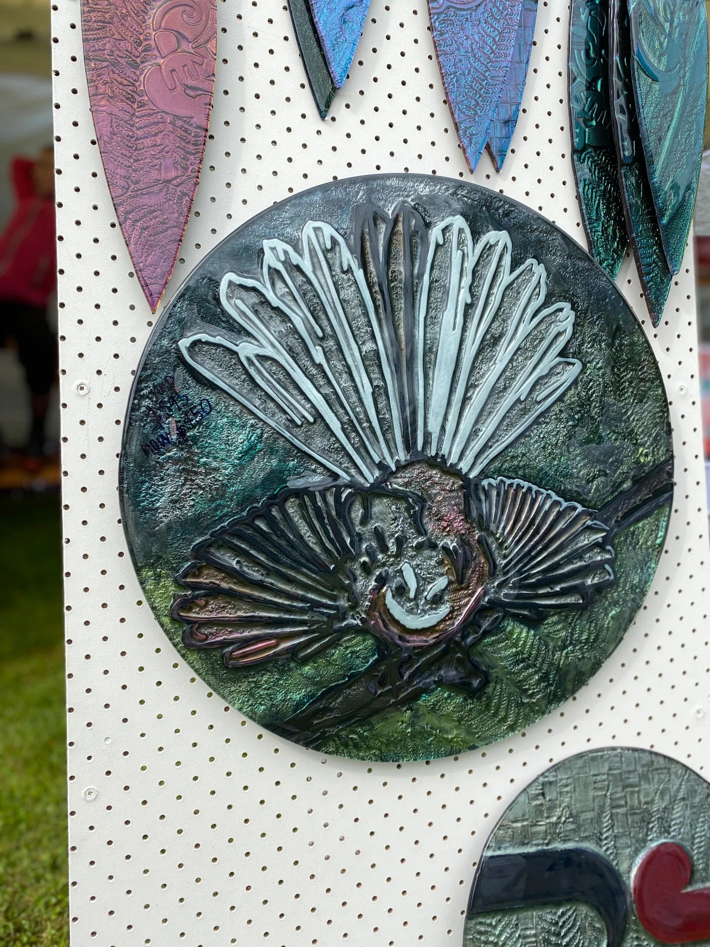Fantail hand painted disc circular wall art outside