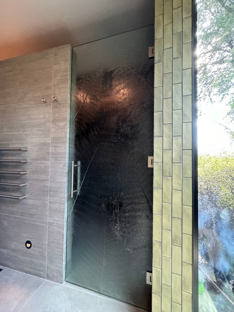 Fern door for a shower entry in slumped glass new zealand
