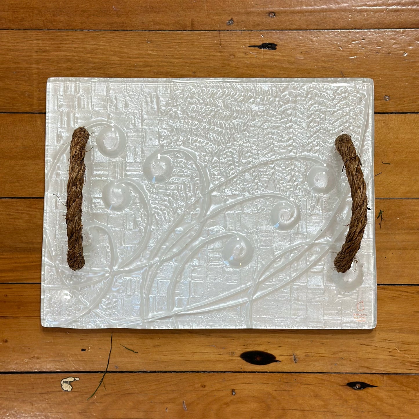White rope handle platter in koru and fern pattern