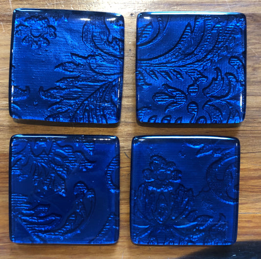 Set of four glass coasters 