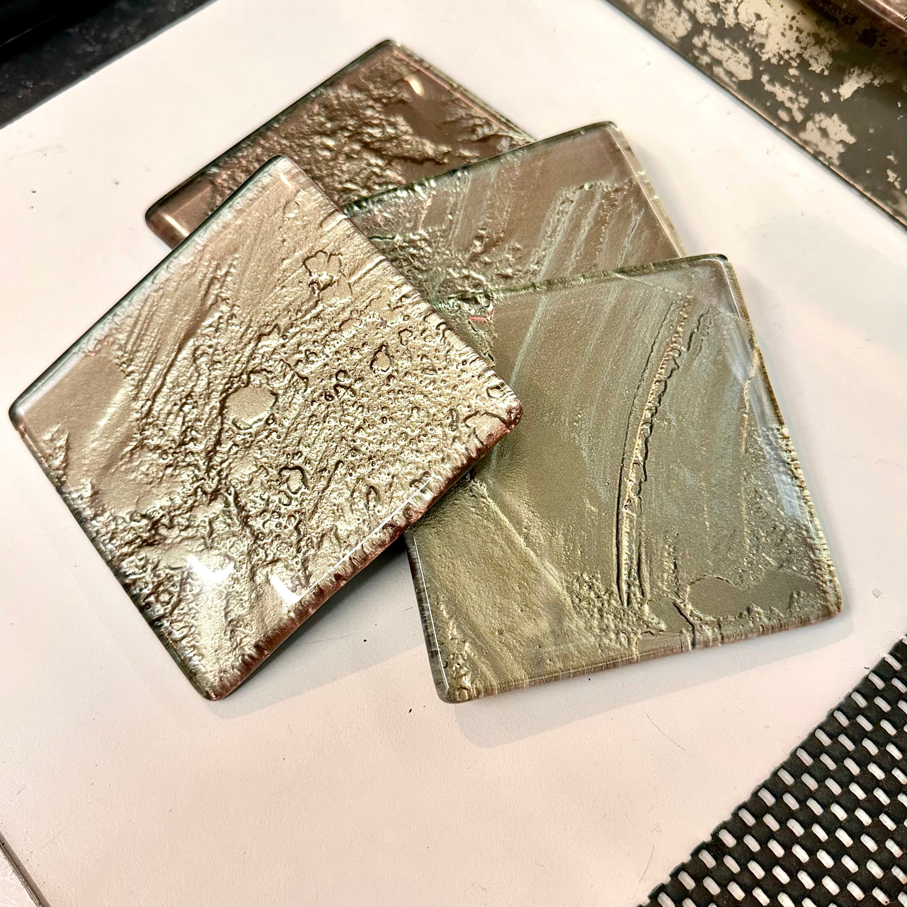 Freescape set of 4 coasters Gold