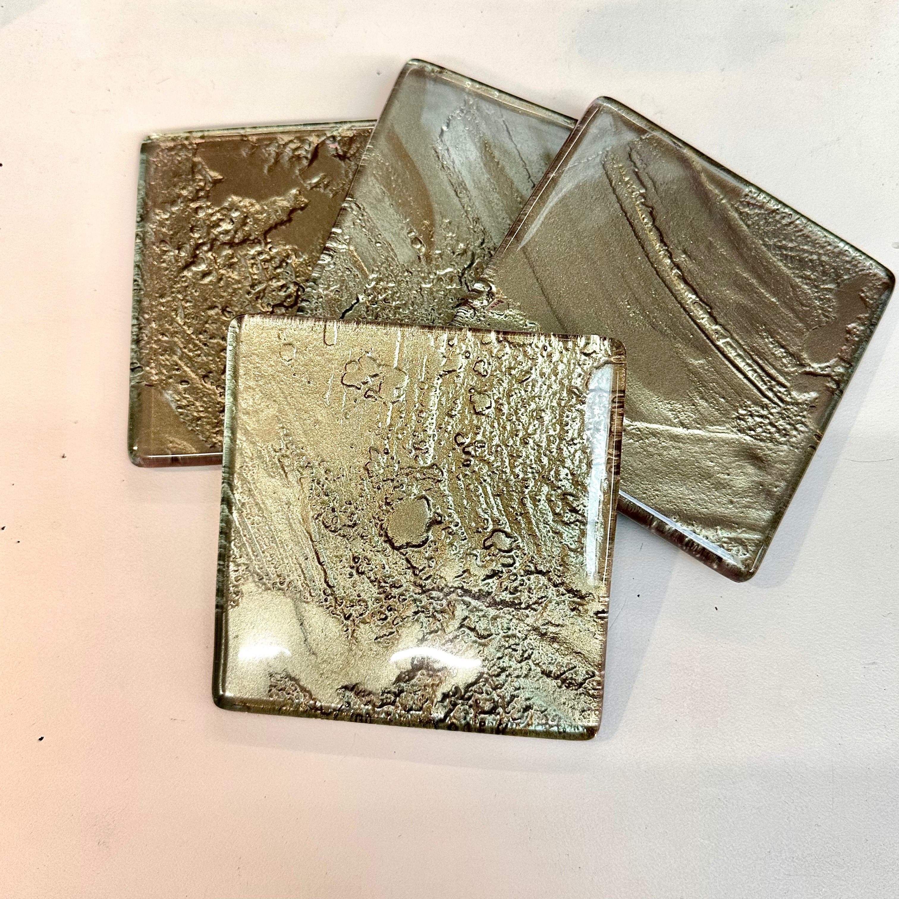 Freescape set of 4 coasters Gold