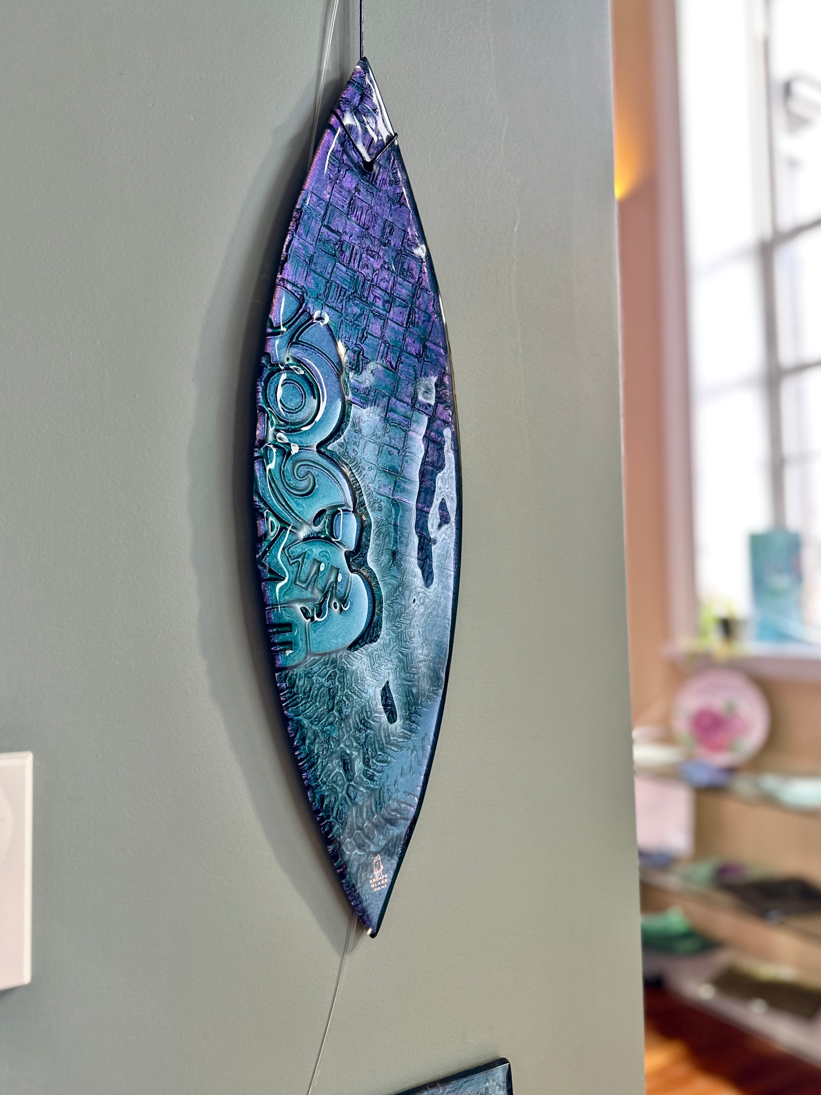Kal Paua Waka wall art with Tiki